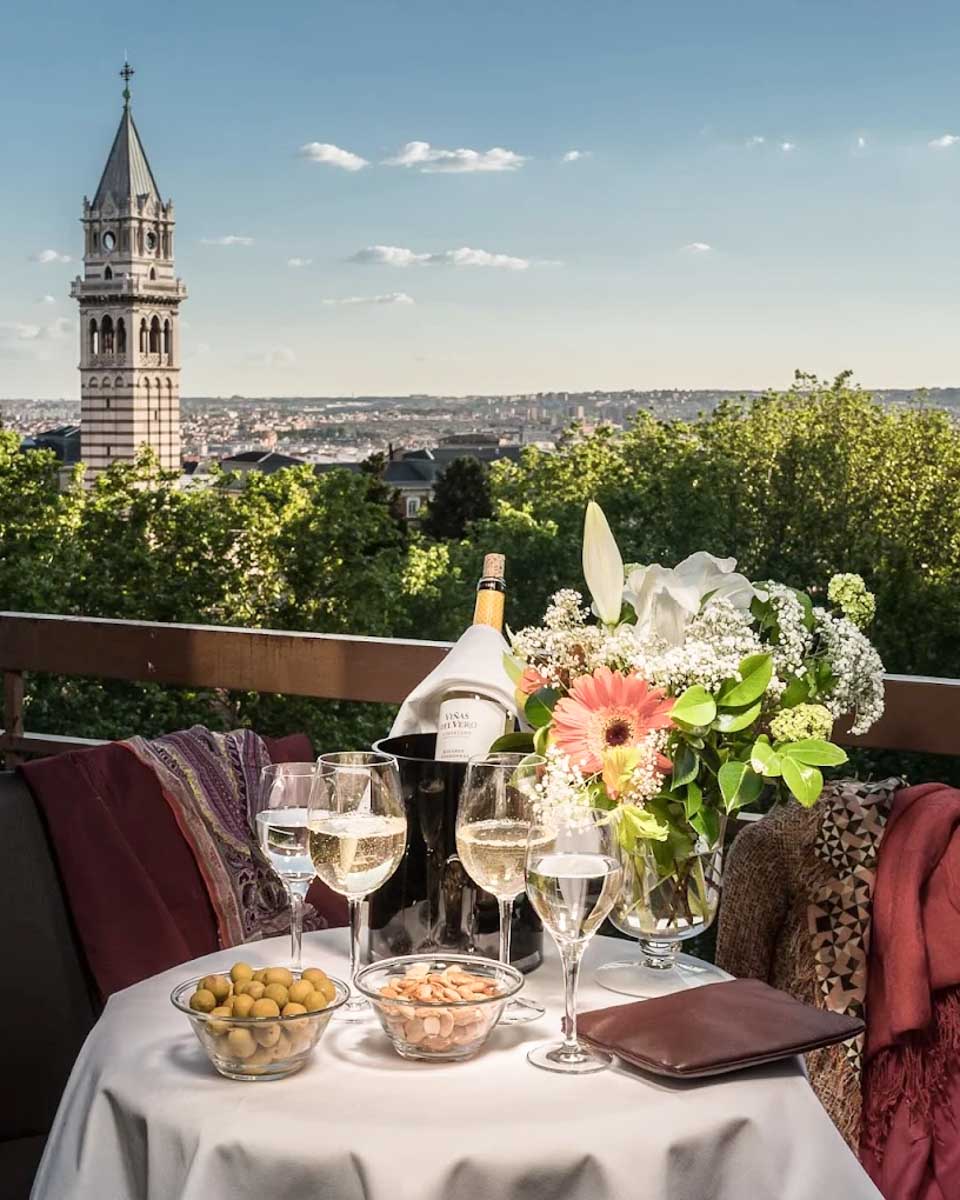 Wine on the balcony with a view at Agumar Atocha Madrid