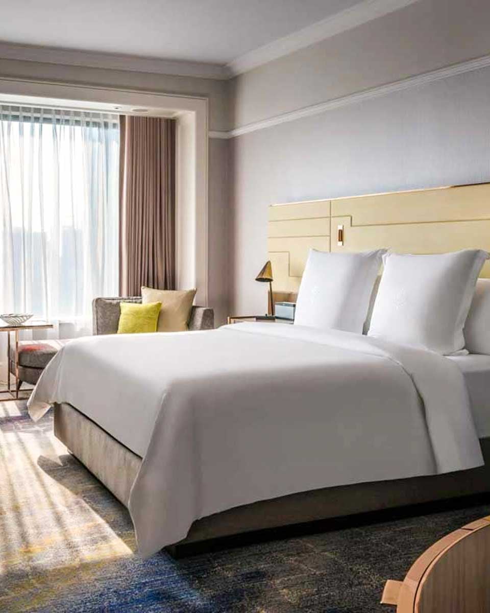 guest room in Four Seasons Hotel Singapore in Singapore
