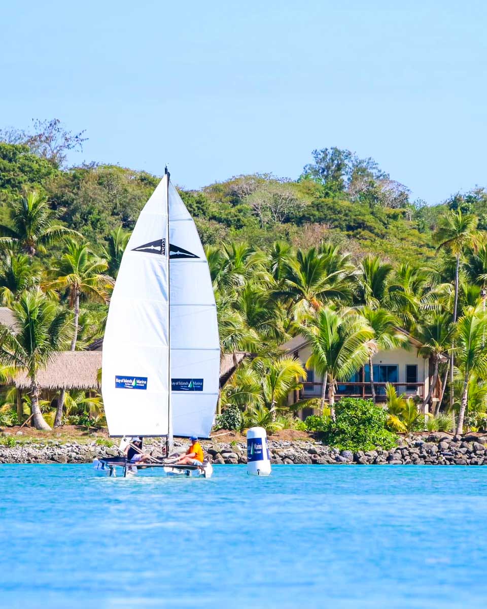 A sailboat on the water at Musket Cove Island Resort in Fiji