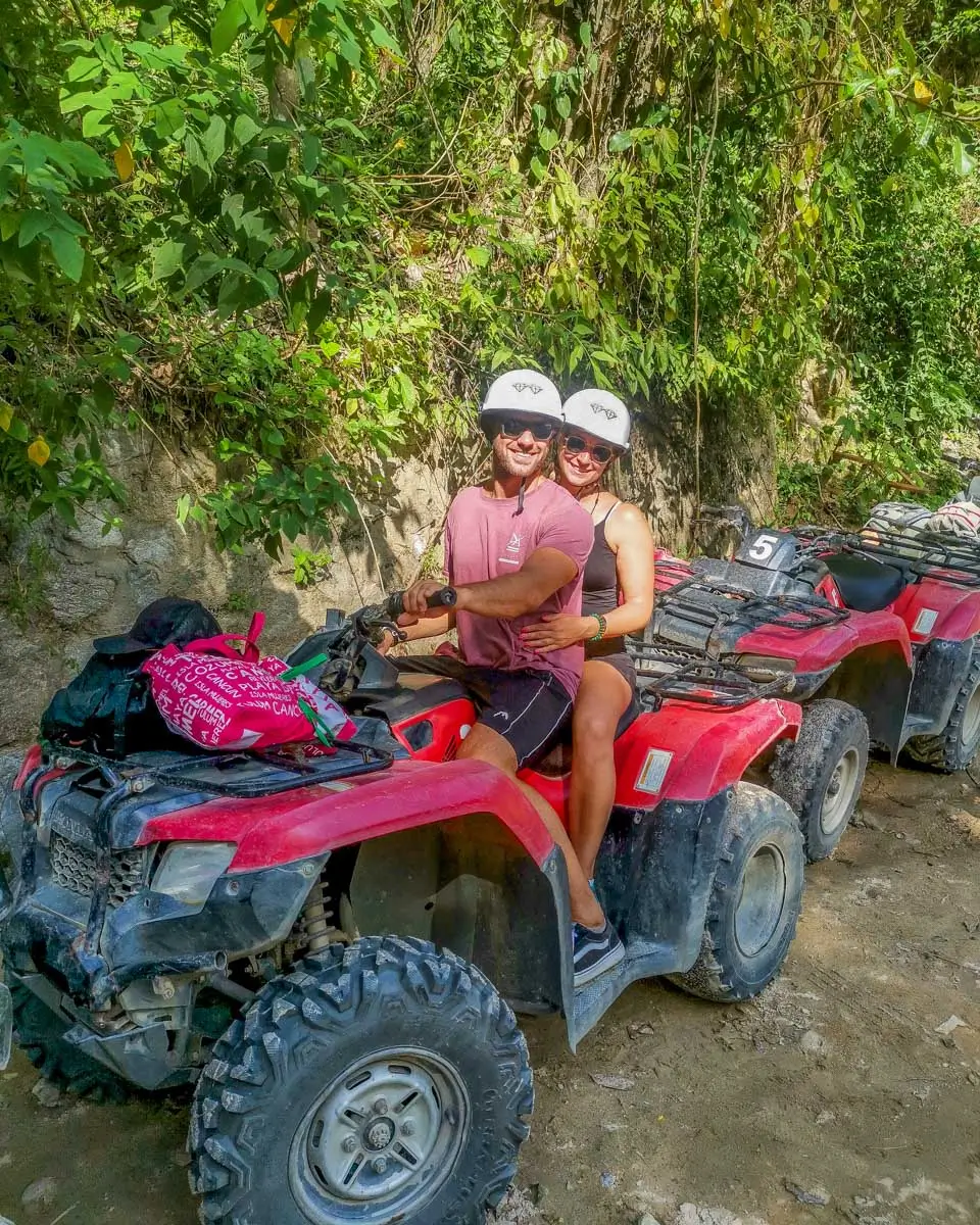 Bailey and Daniel riding an ATV to Jade Caverns and Mayan Village in Cozumel, Mexico
