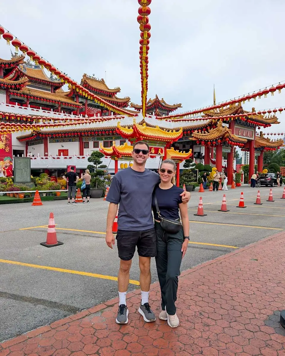 Bailey and Daniel taking a photo in front of Thean Hou Temple in Kuala Lumpur, Malaysia