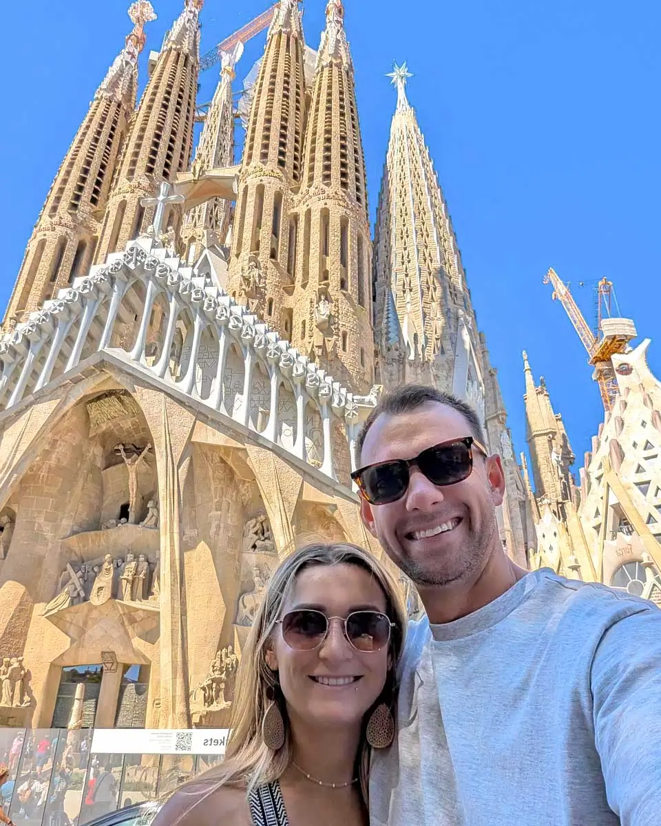 Bailey and Daniel taking selfie in front of Sagrada Familia in Barcelona