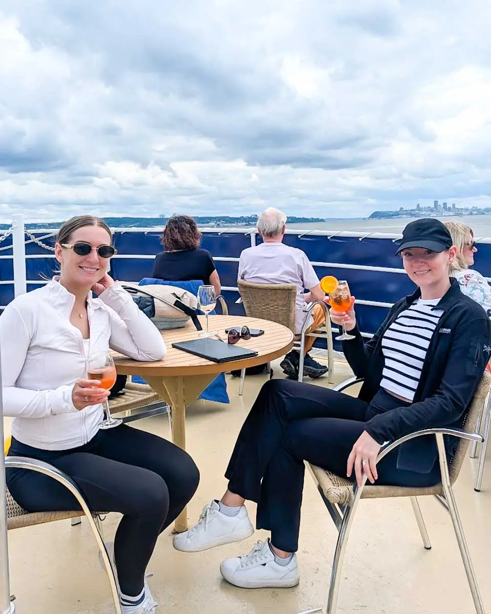 Bailey and her friend on a cruise along the St. Lawrence River in Quebec