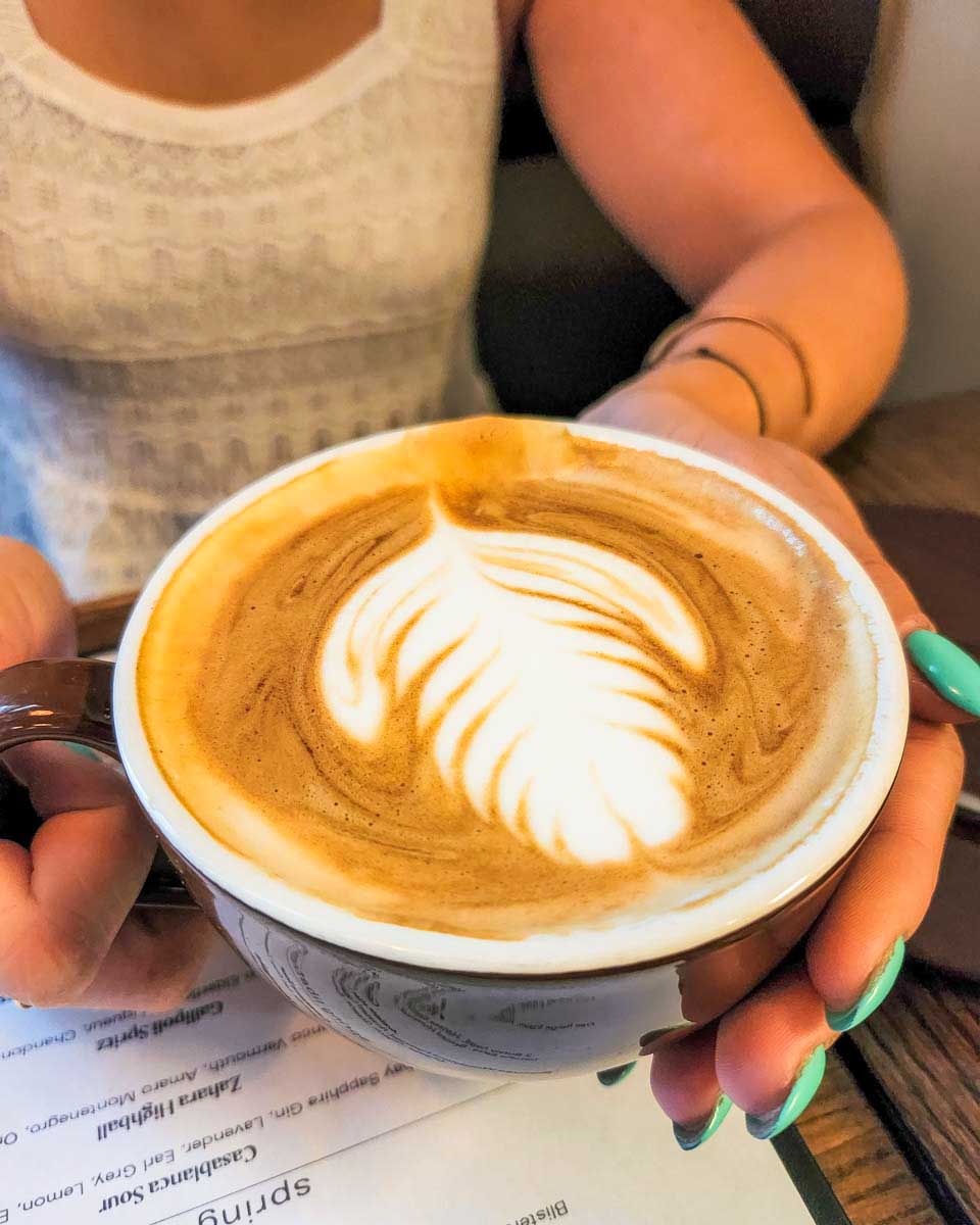 Bailey-drinks-coffee-in-Boulder-Colorado