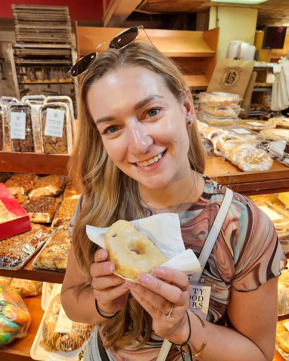 Bailey eats a donut in Philadelphia, Pennsylvania