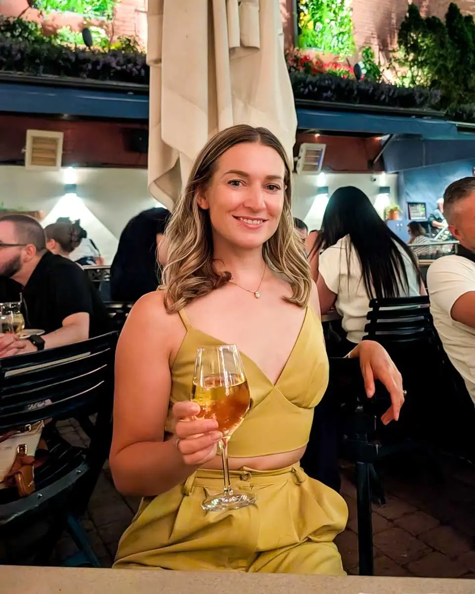 Bailey having a drink at Jardin Nelson restaurant in Montreal