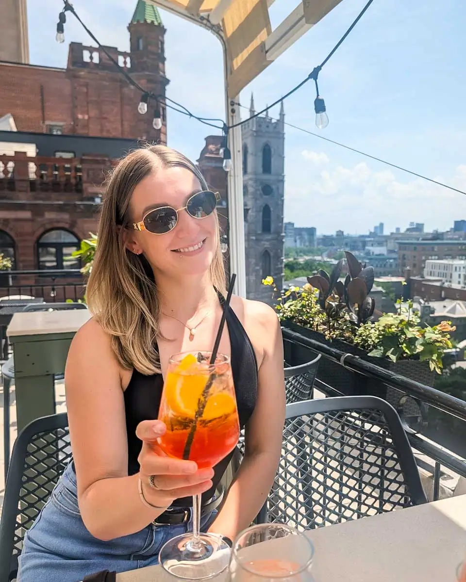 Bailey having a drink at Terrasse Place D’Armes in Montreal, Quebec