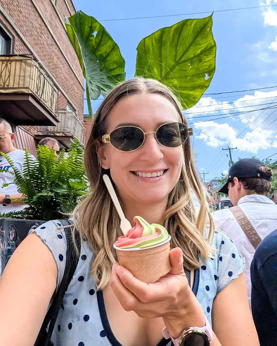Bailey holding ice cream on a food tour in Montreal, Quebec