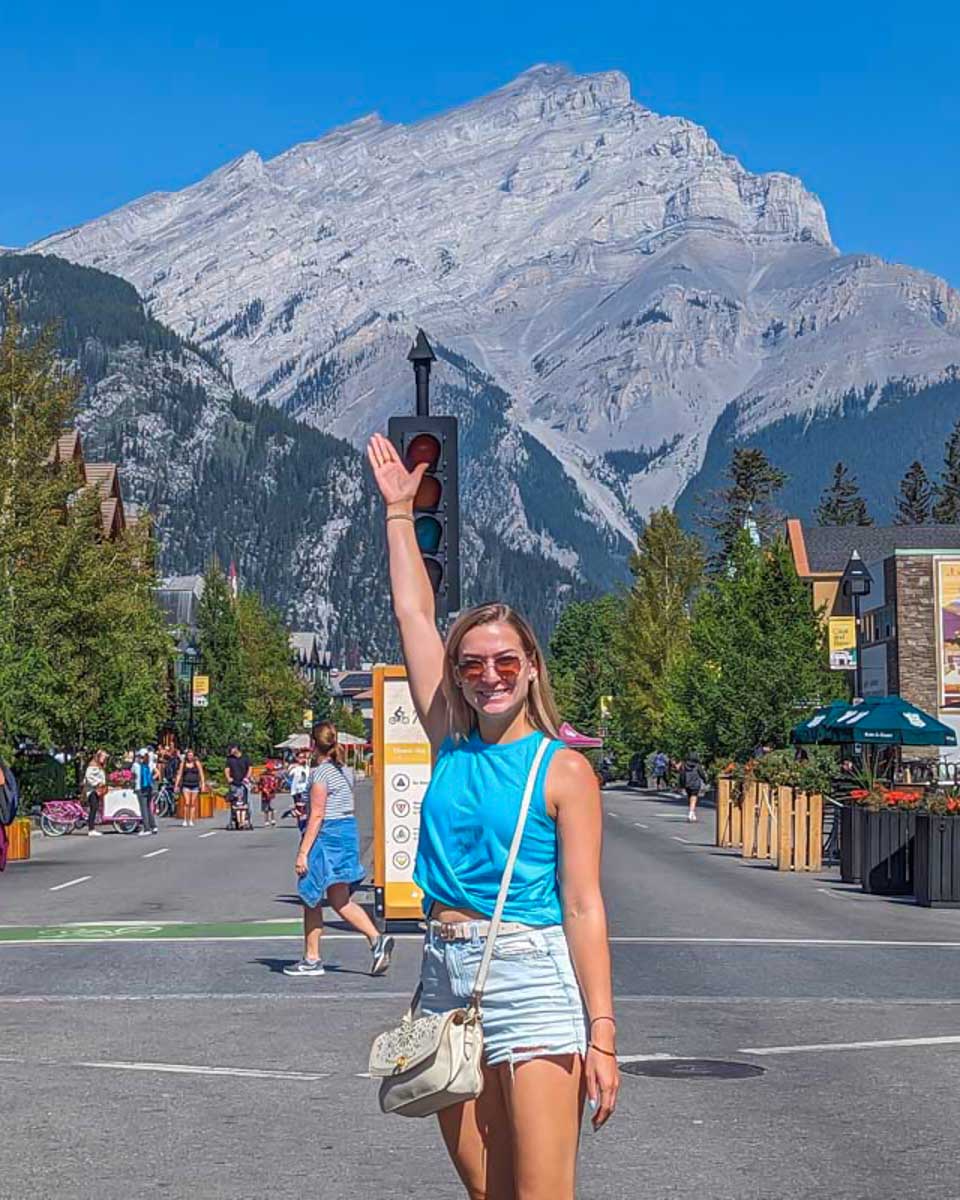 Bailey-poses-for-a-photo-on-Banff-Ave-walking-street
