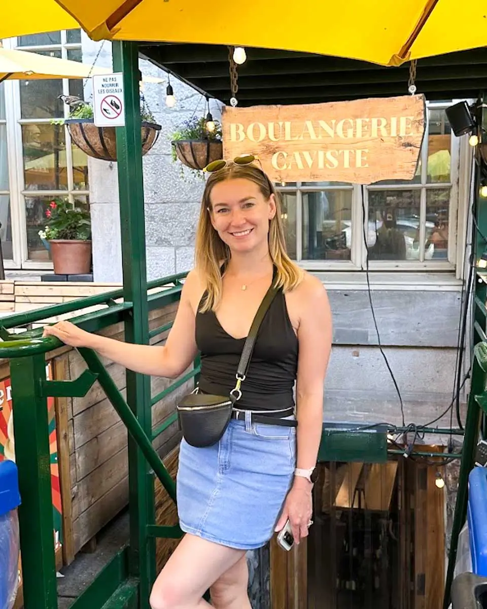 Bailey posing in front of the Boulangerie caviste bakery in Montreal, Quebec