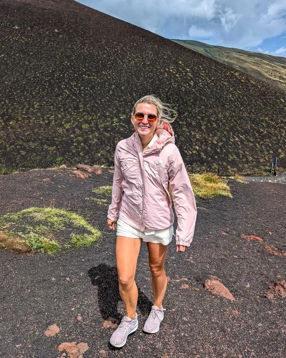 Bailey stands at Mt Etna visited on a tour from Syracuse, Italy