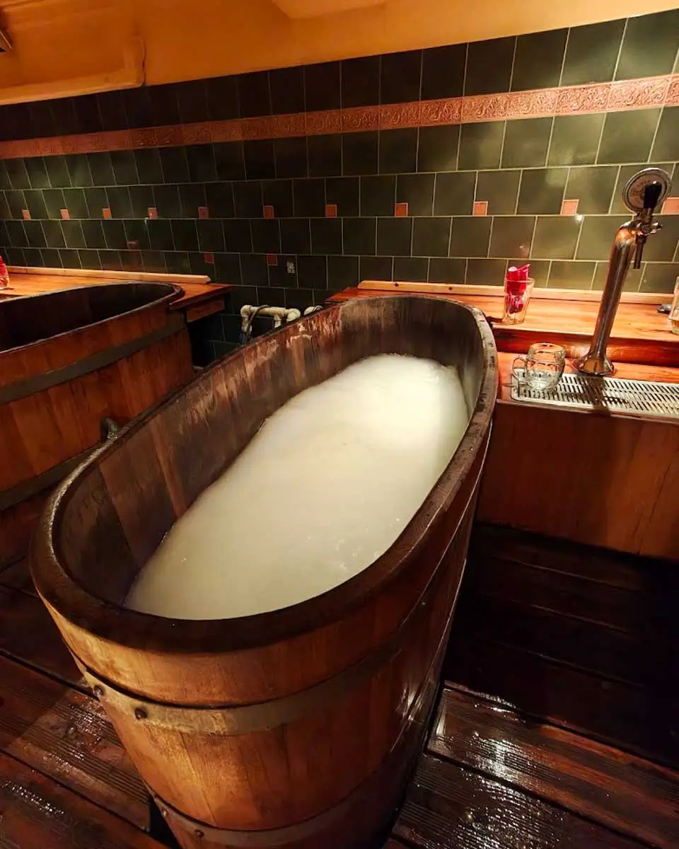 Wooden bath tubs at Beer & Spa in Budapest