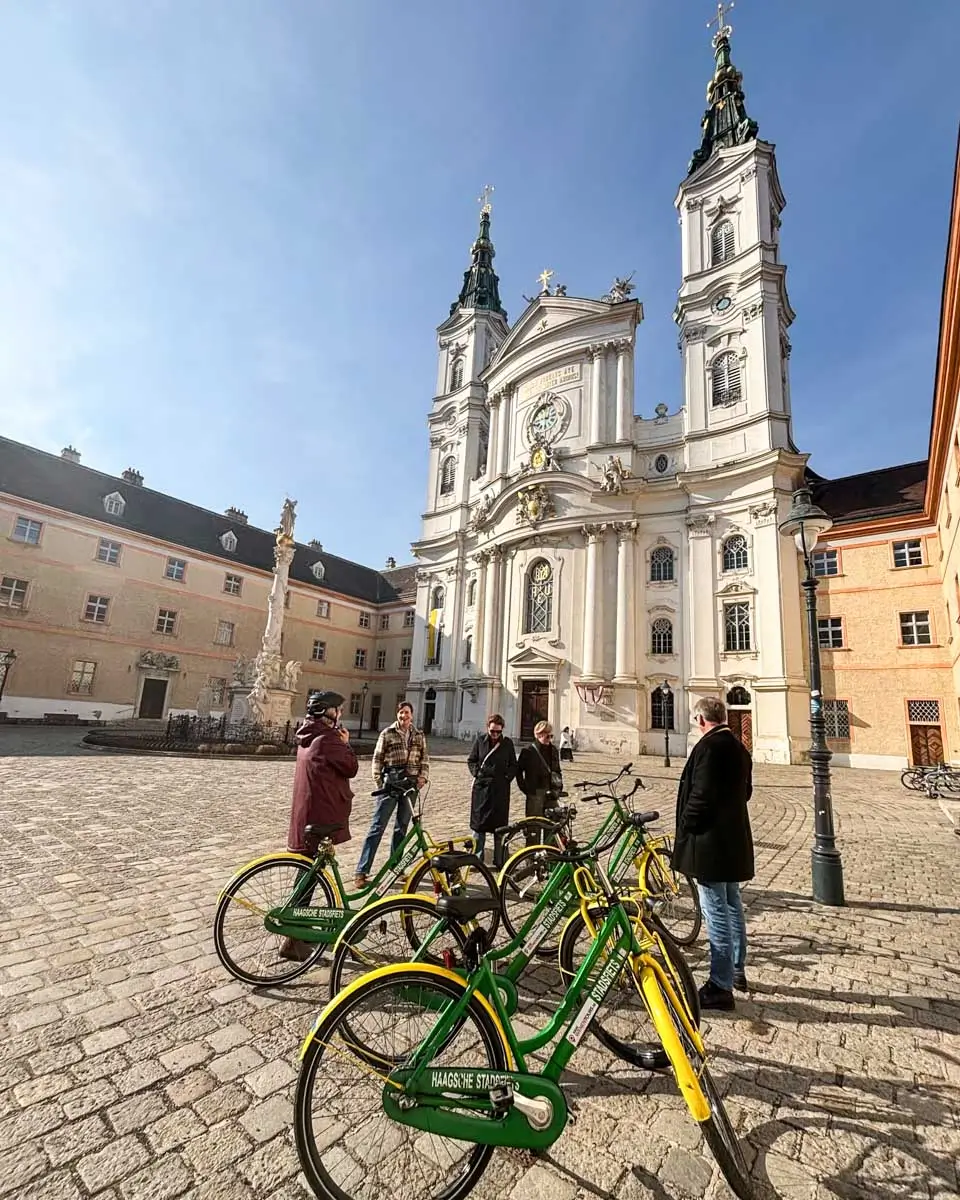Cyclists outside the Piarist Church in Vienna