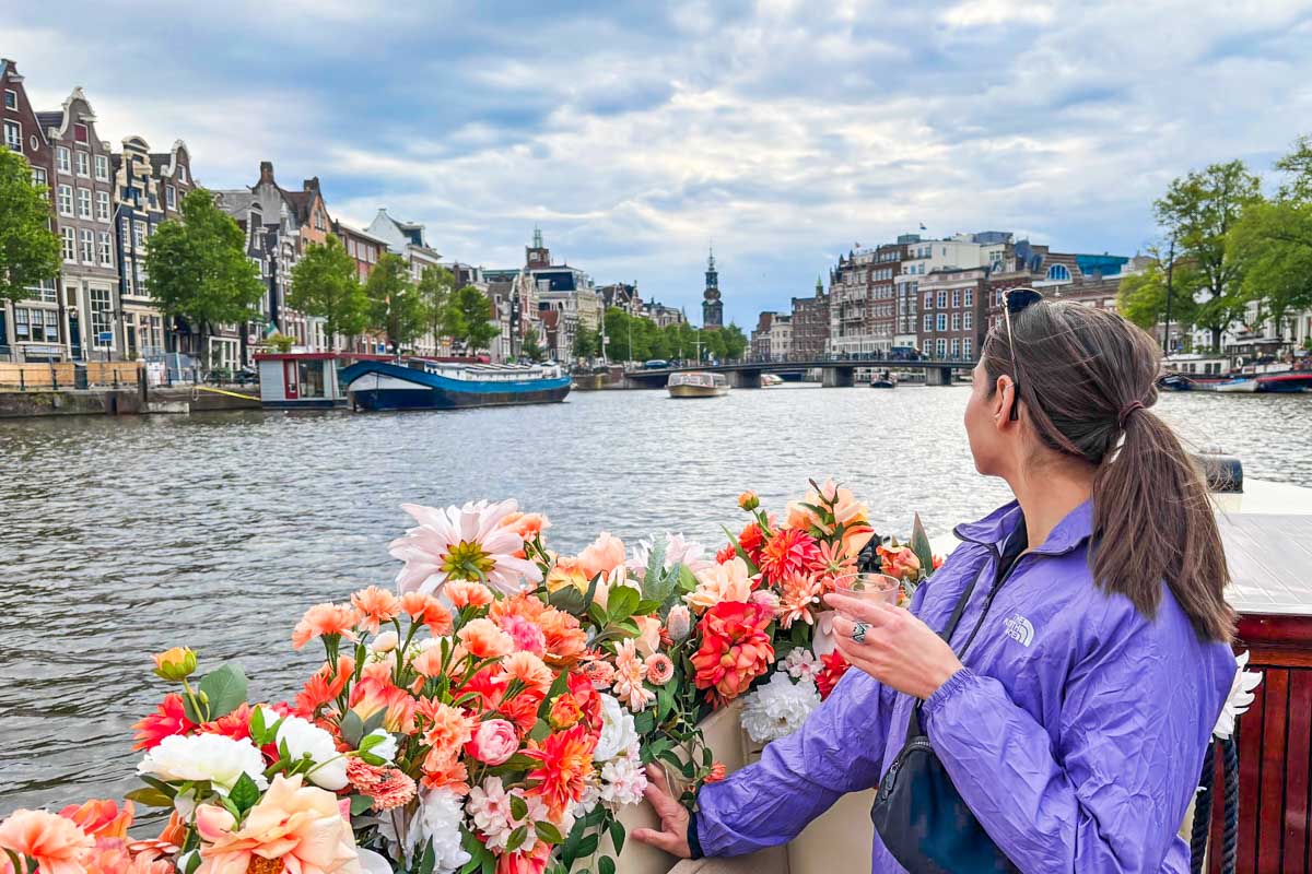 Brittni looks out over the canal on a cruise in Amsterdam