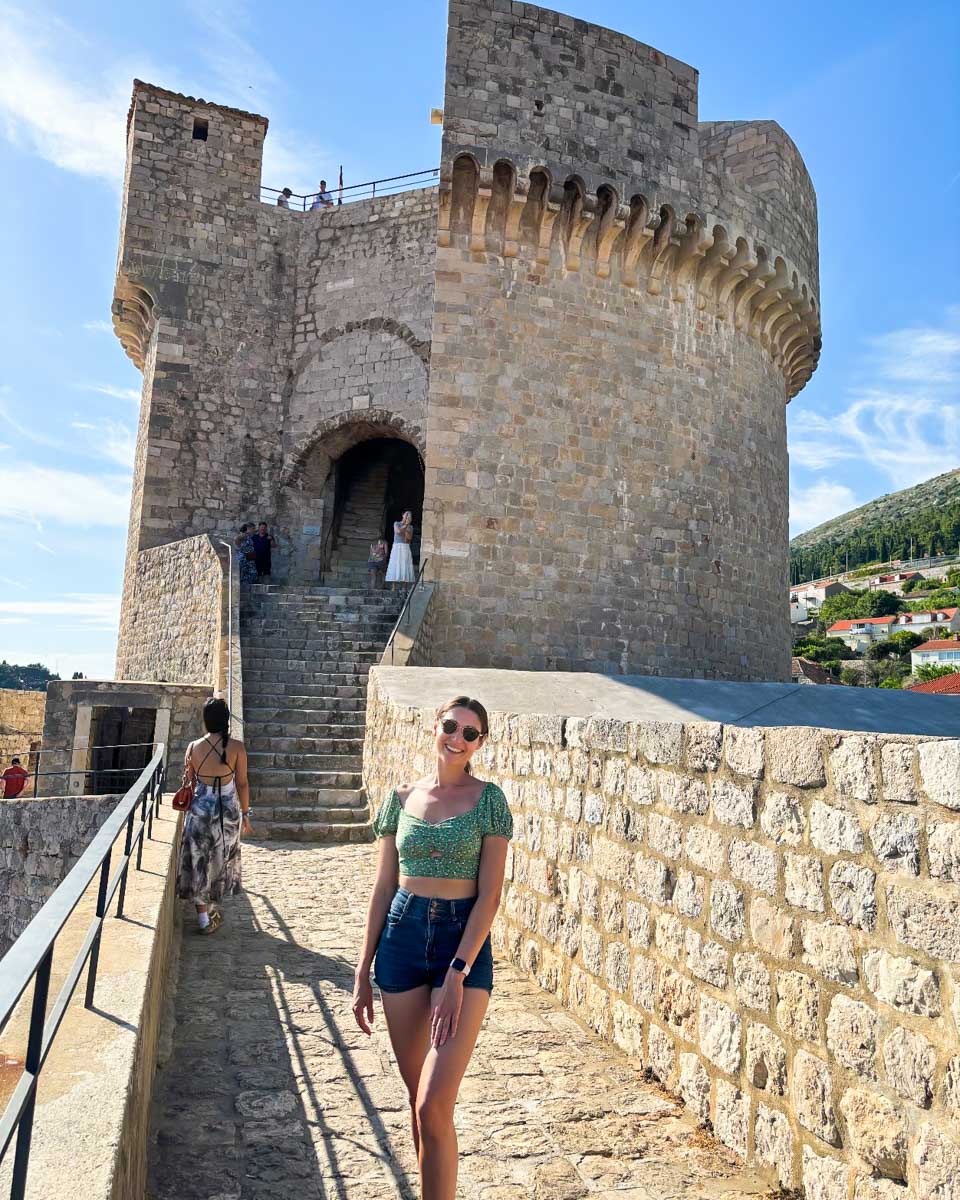 Brittni smiles while walking the Old City Walls in Dubrovnik, Croatia