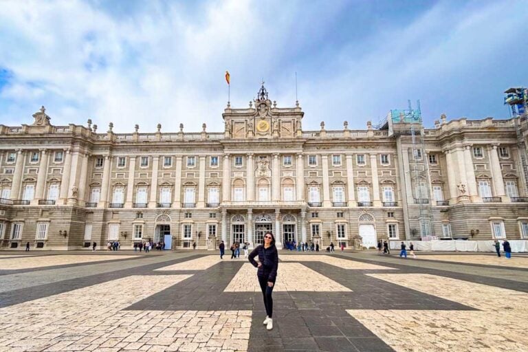 Brittni stands in front of the Royal Palace of Madrid in Spain