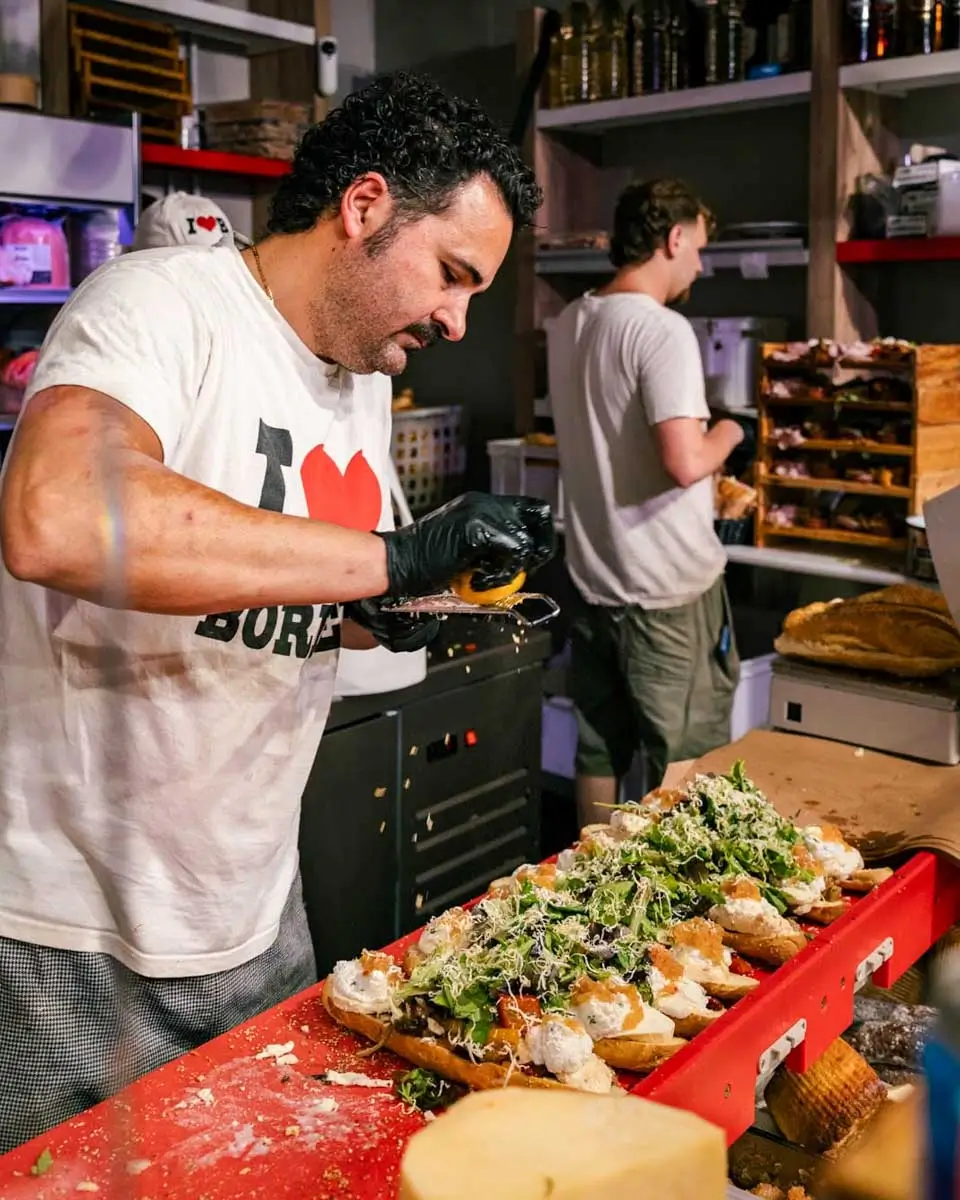 Chef making sandwiches at Caseificio Borderi, Syracuse, Italy