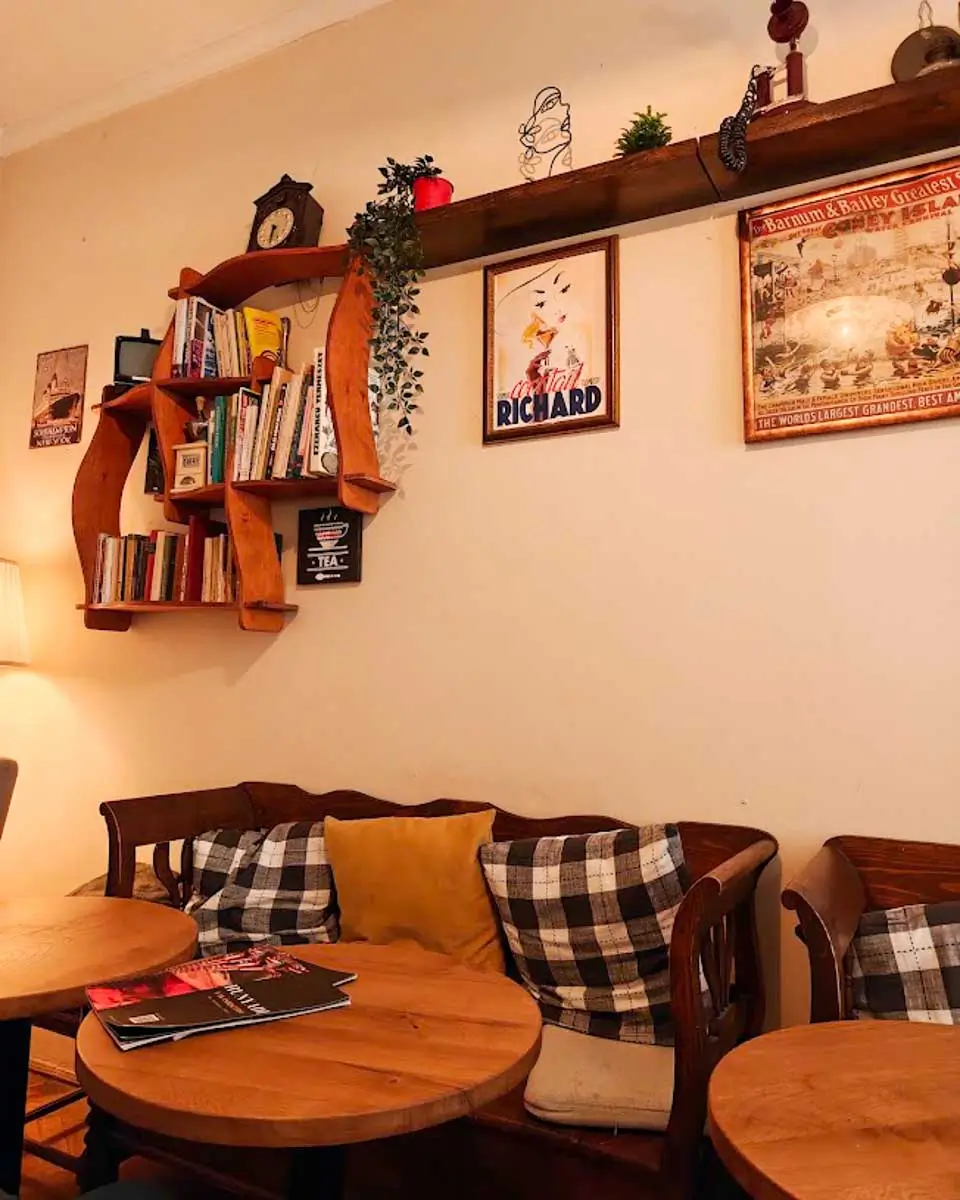 Cozy indoor seating area of Hunyadi Restaurant in Budapest