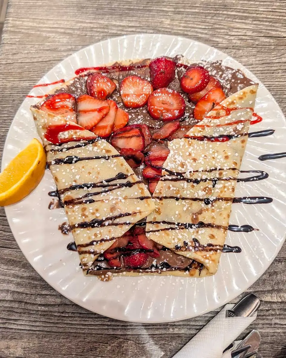 Crepe with strawberries eaten at the Crêperie Maison Bagatelle in Montreal, Quebec