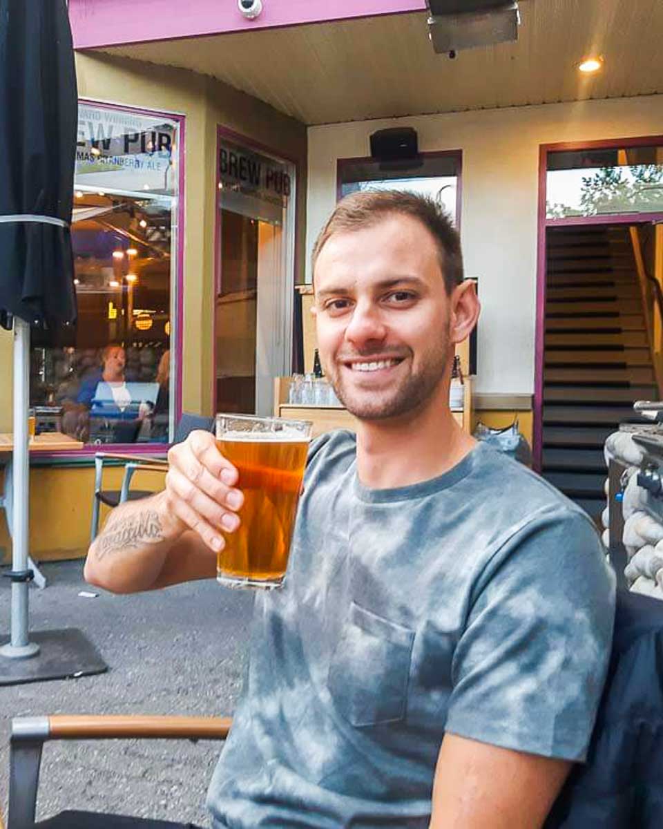 Dan enjoys a beer at Grizzly Paw Brewery in Canmore