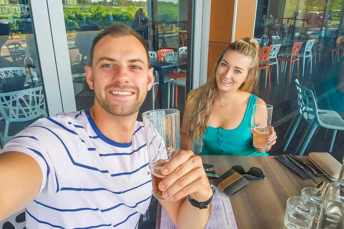 Daniel and Bailey taking a selfie at a restaurant in Barcelona