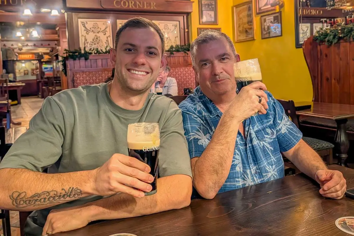 Daniel and family drinking Guinness in a pub in Cardiff Wales