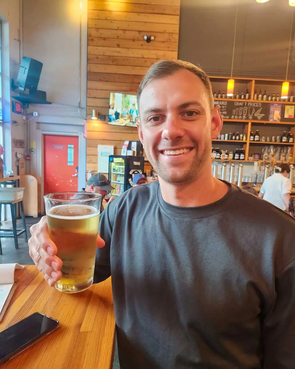 Daniel drinks beer in Salem Massachusetts (1)