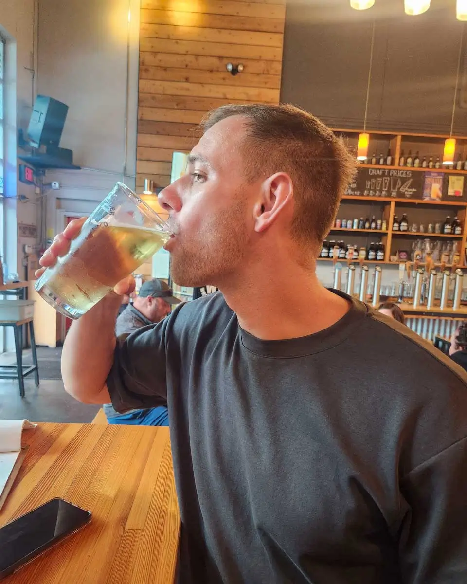 Daniel drinks beer in Salem Massachusetts (2)
