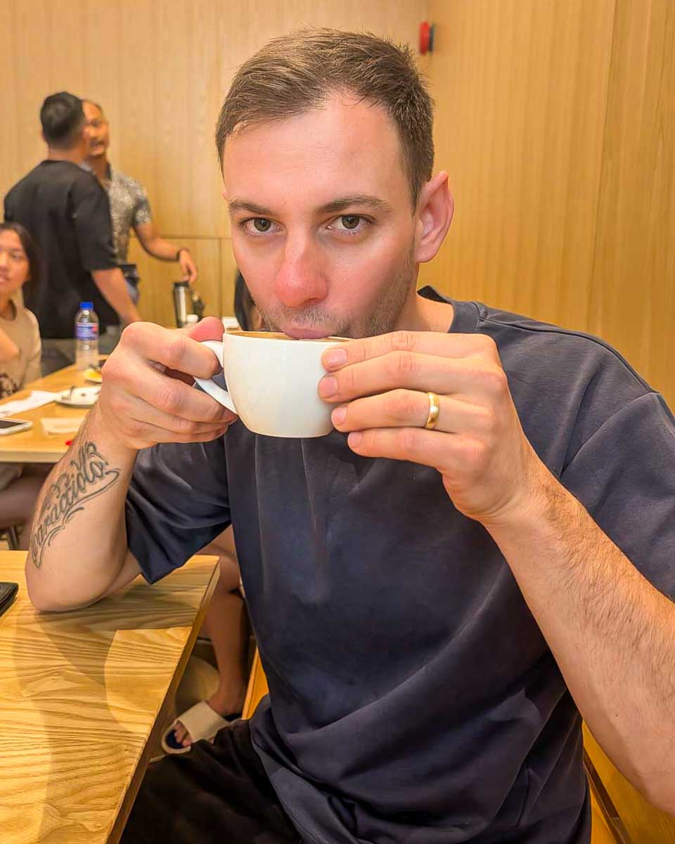 Daniel-drinks-coffee-out-for-breakfast-in-Ottawa