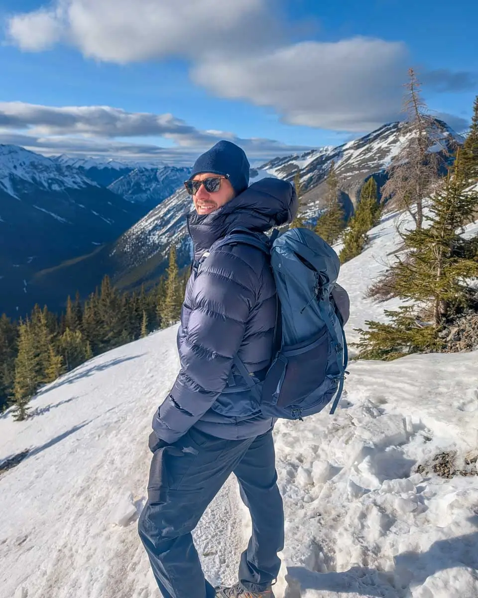 Daniel hikes in the winter near Canmore, Alberta, Canada
