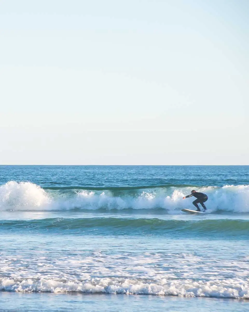 Daniel surfing in Newport Beach, California