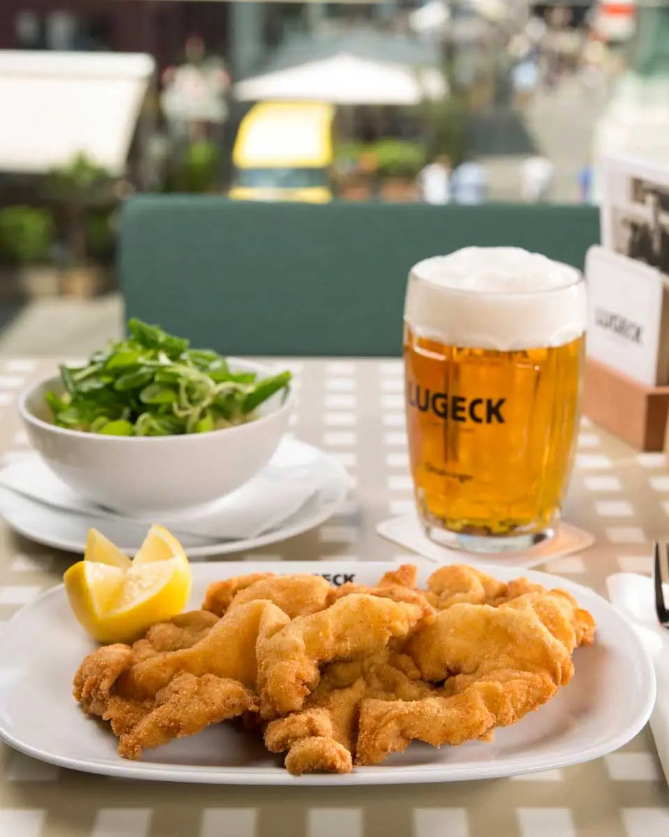 Classic Wiener schnitzel and beer at Lugeck Figlmüller in Vienna