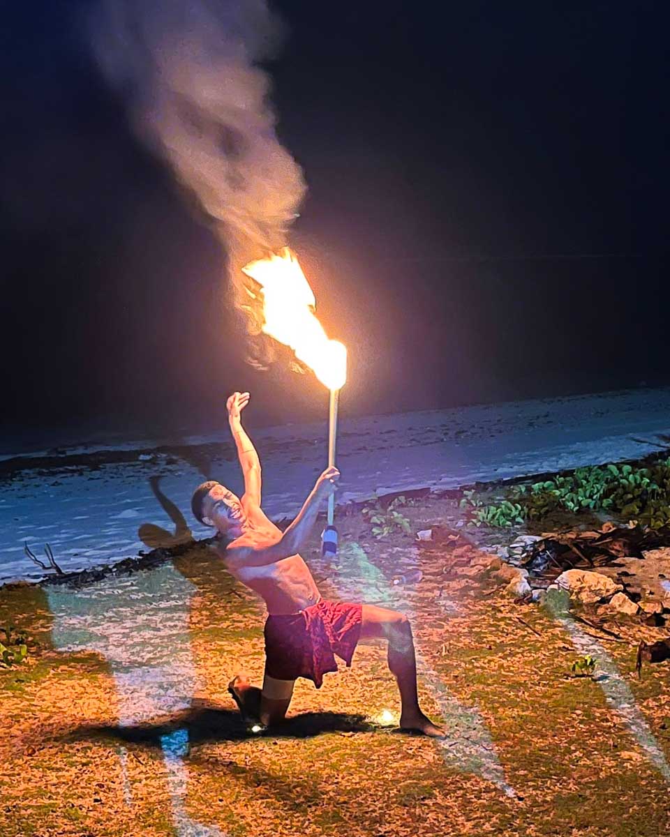 Fire dancer performs at Mana Island Resort & Spa in Fiji