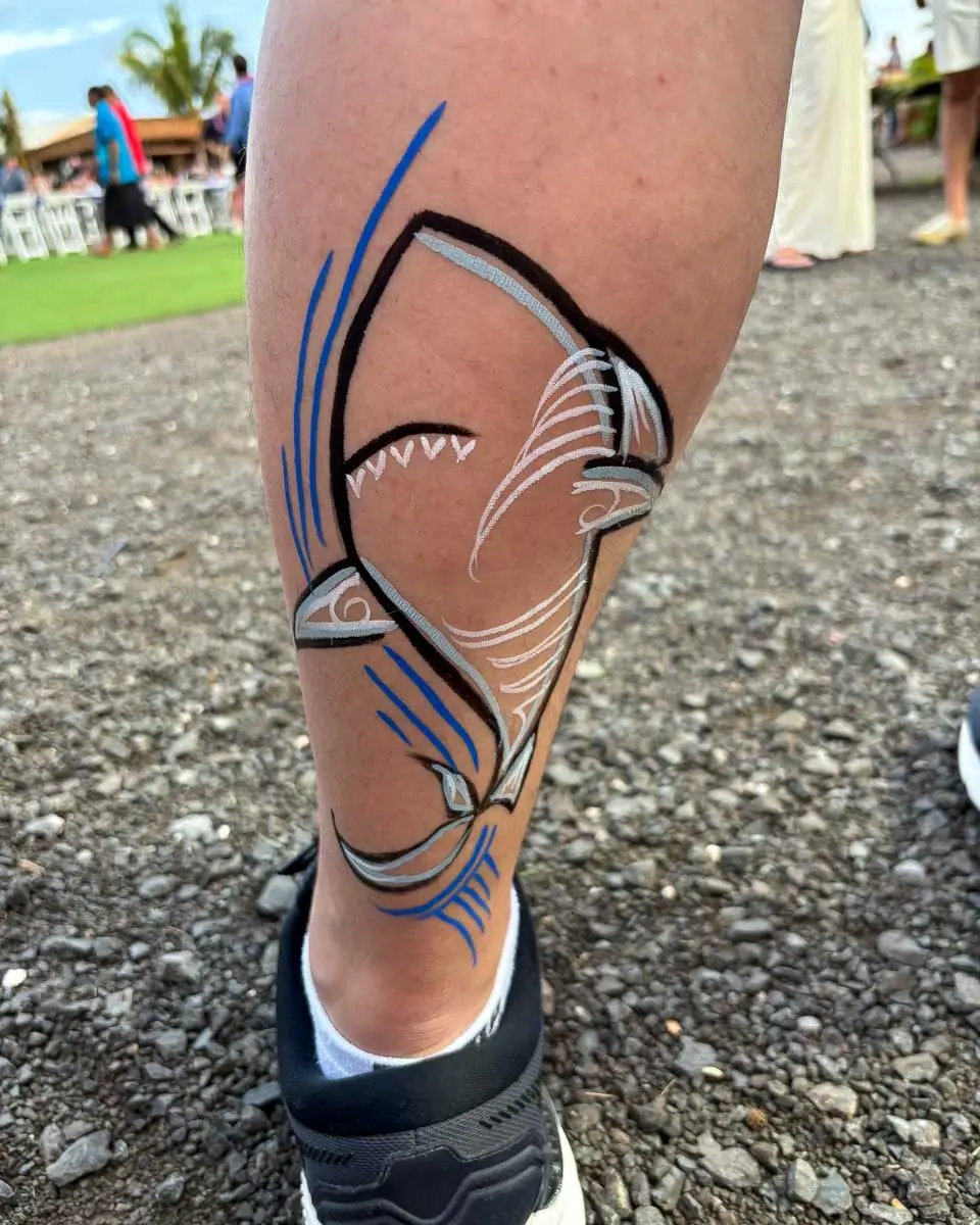 Hand painted-tattoo at a luau in Hawaii USA