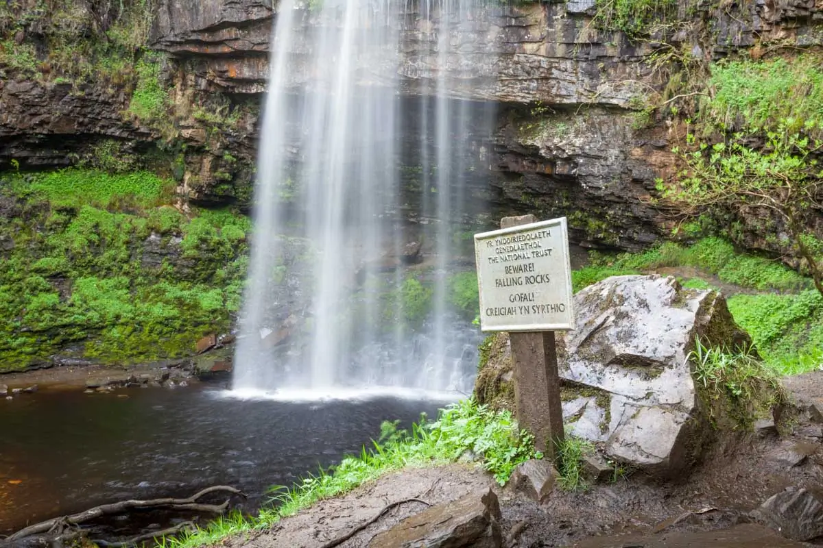 Henrhyd Falls seen on a rainy day on a tour from Cardiff Wales