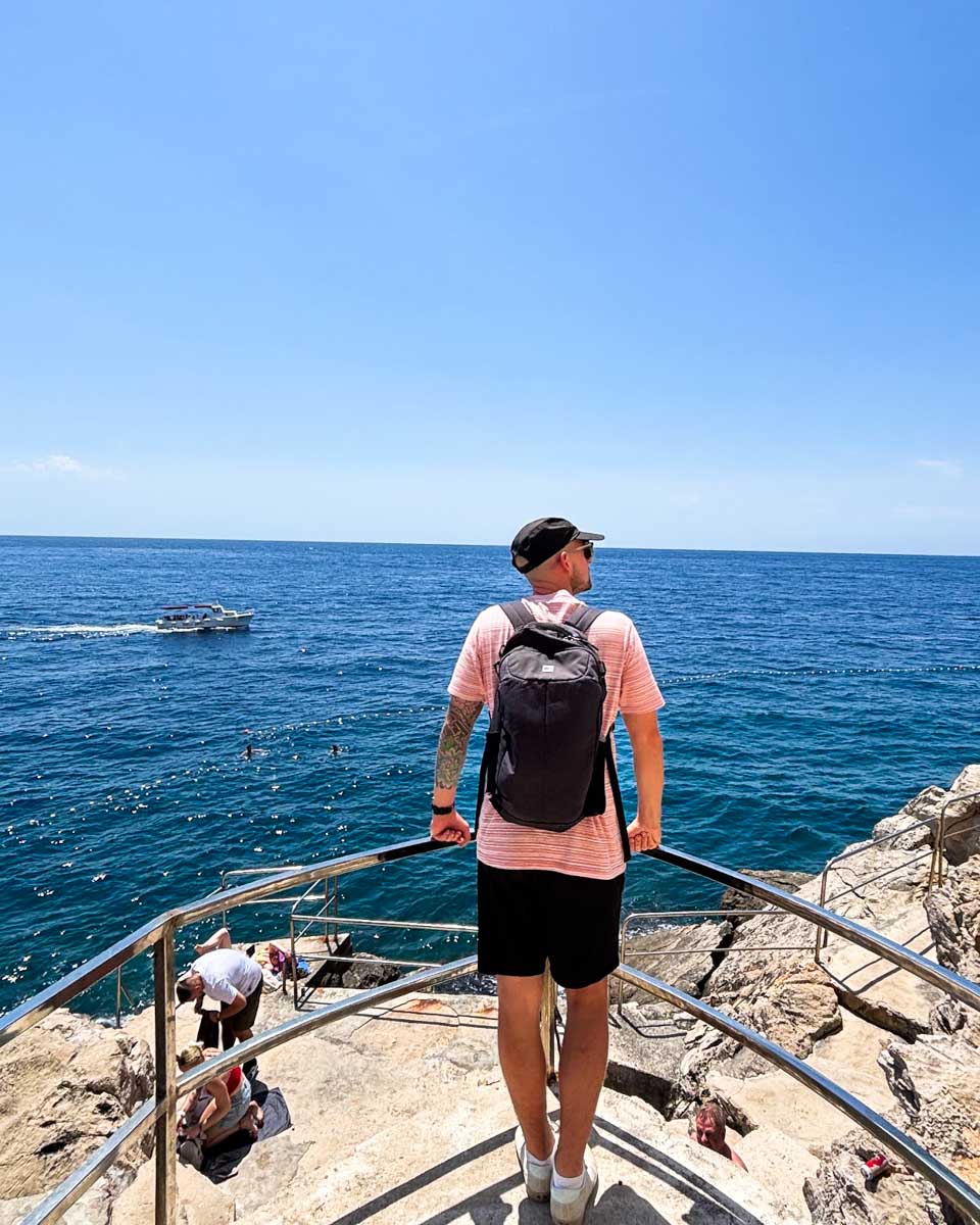 Jesse looks out over the Adriatic at Buza Bar in Dubrovnik