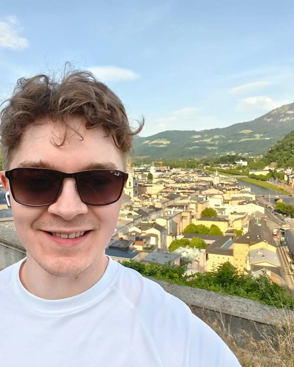 Luke taking a selfie at a viewpoint in Salzburg