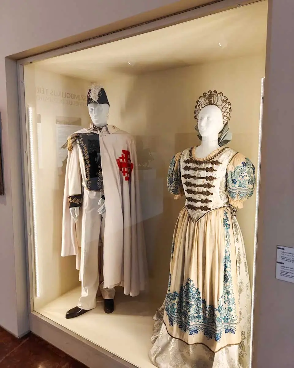 Historic clothing display featuring traditional garments at the Budapest History Museum