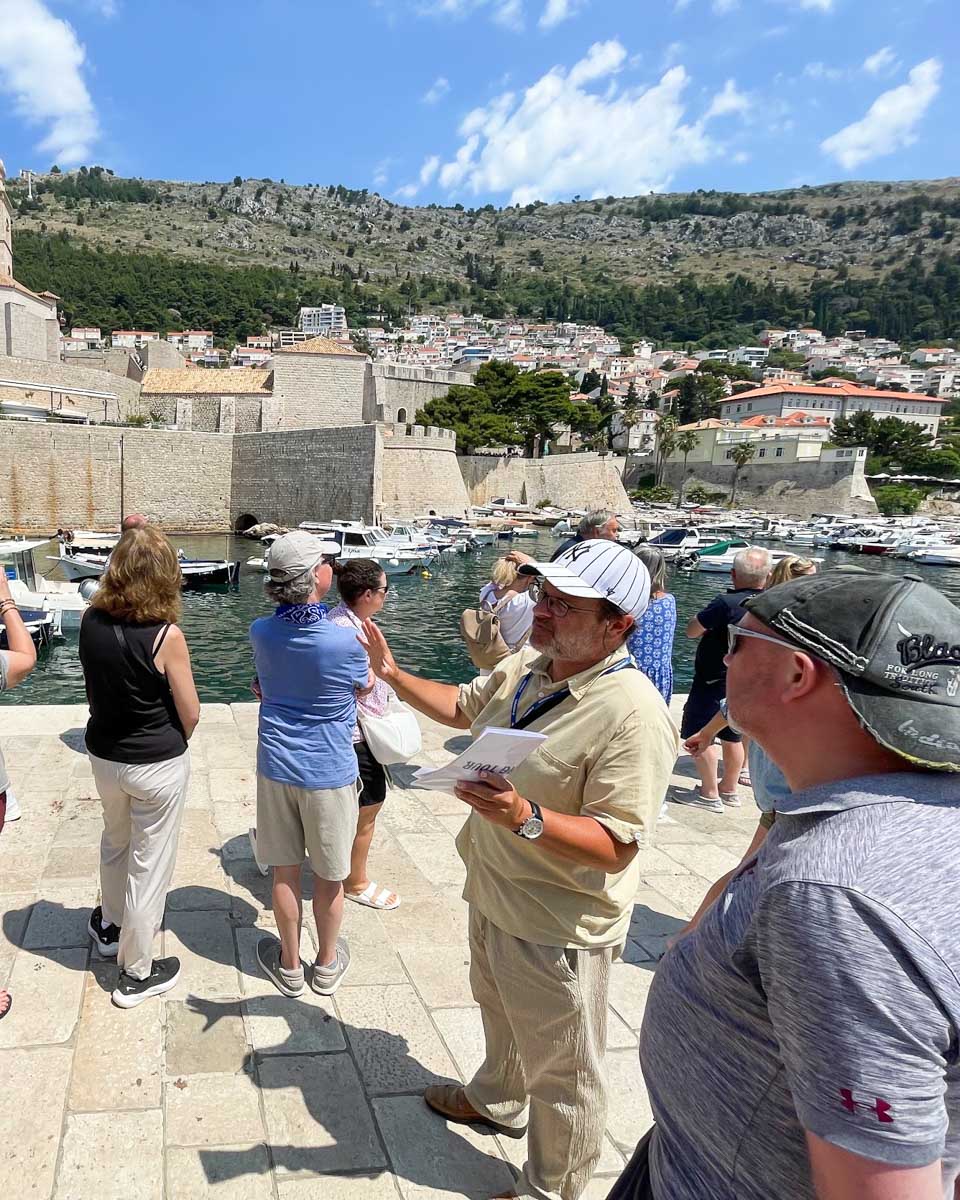 Our tour guide showing us around the Old Town of Dubrovnik on a tour