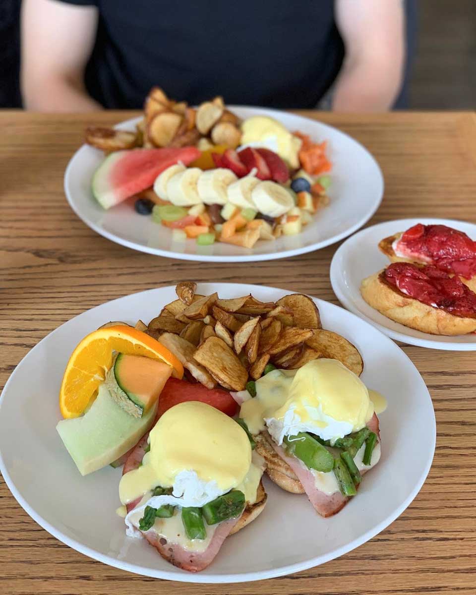People eat breakfast at Chez Francois Restaurant in Canmore