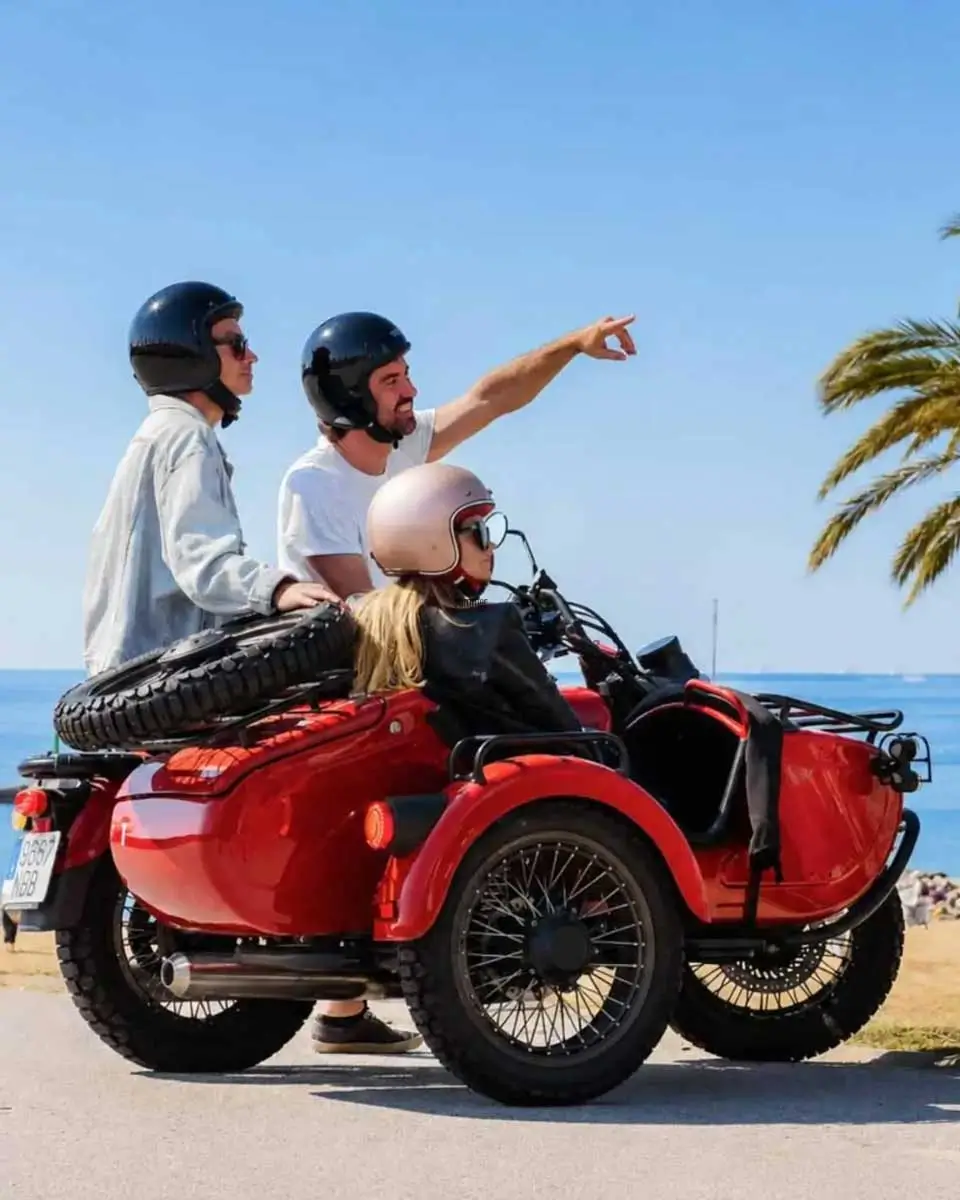 People sitting in sidecar in Barcelona, Spain