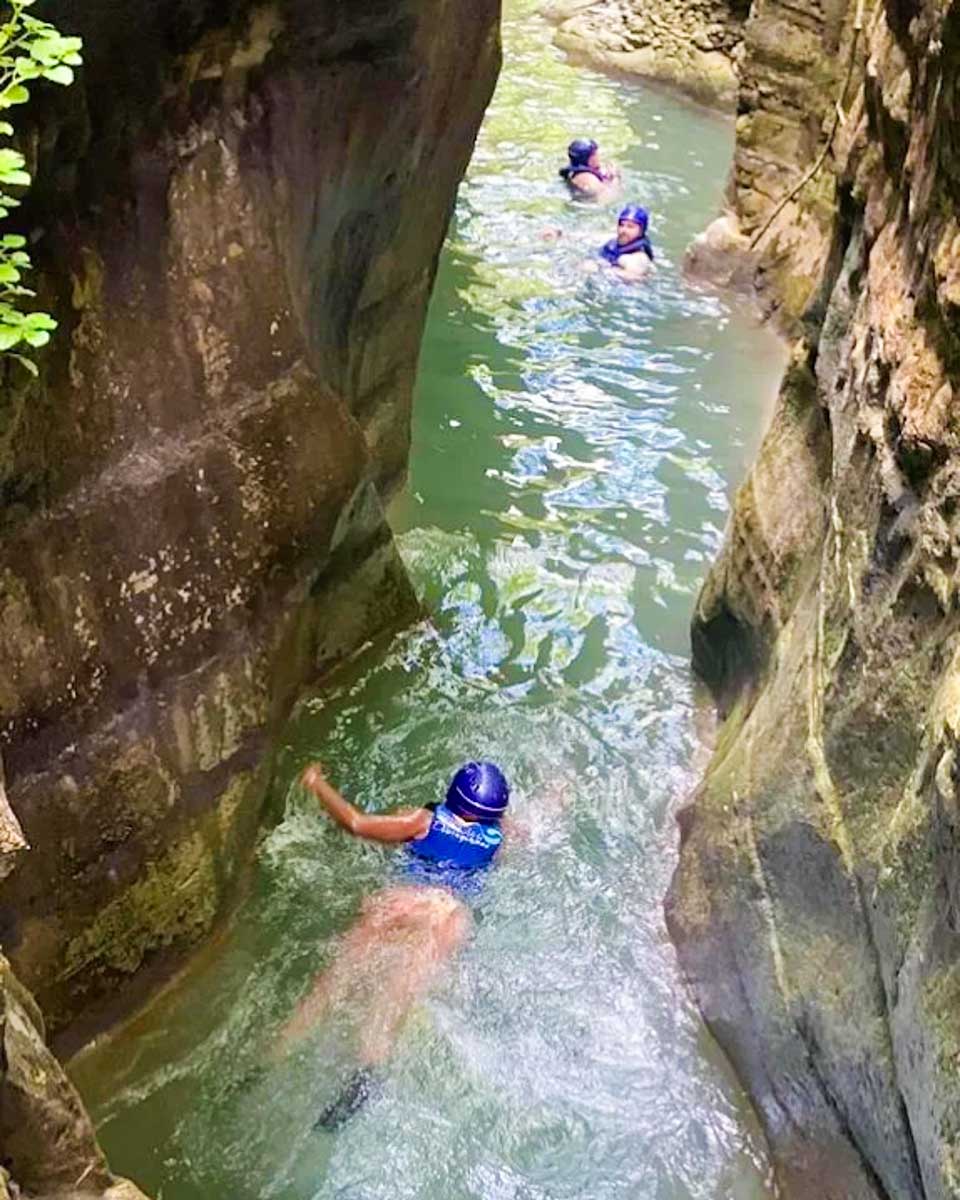 People swim on a canyoning tour with Edwin Transfers Tours in Puerto Plata copy
