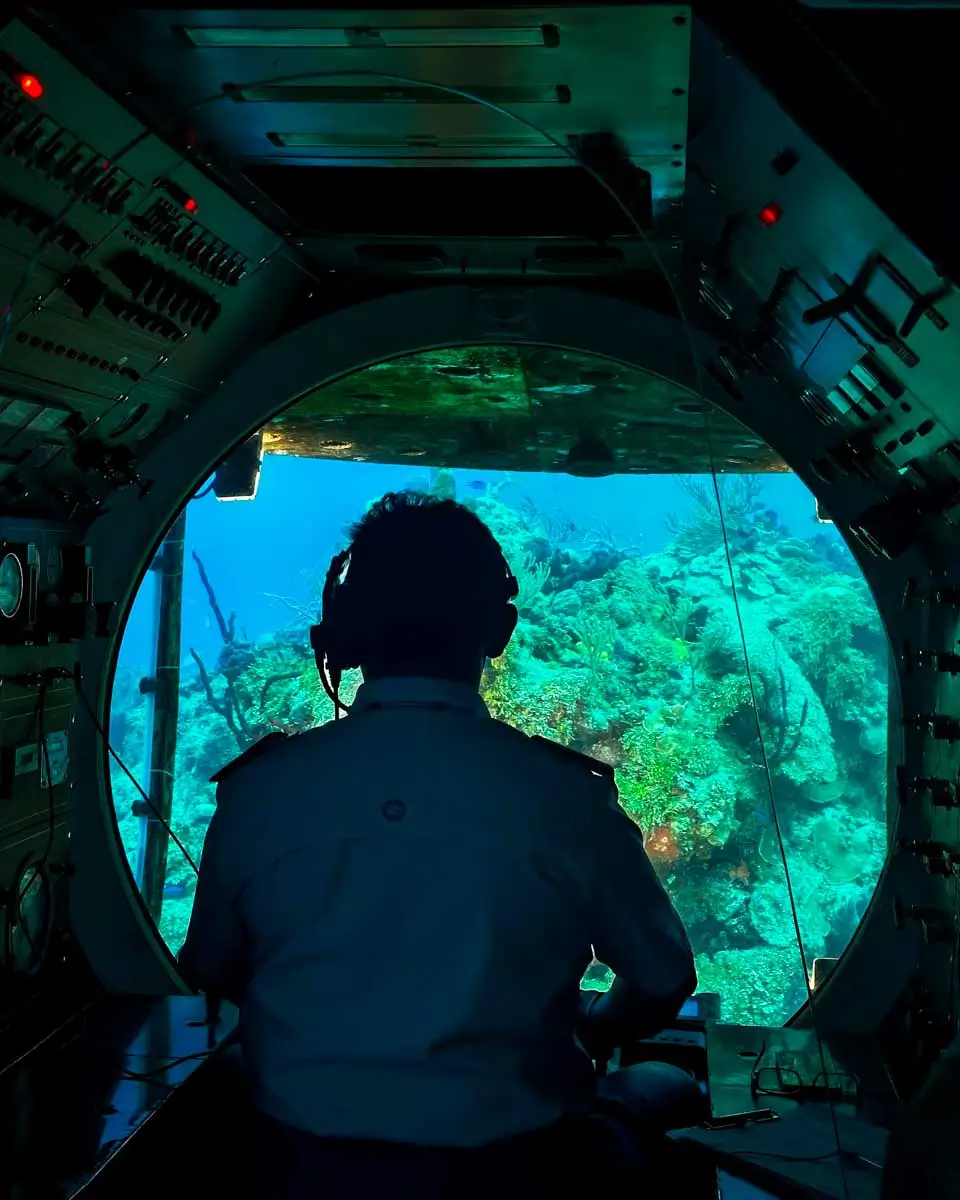 Pilot of submarine at Atlantis Submarine Adventure Cozumel tour Mexico
