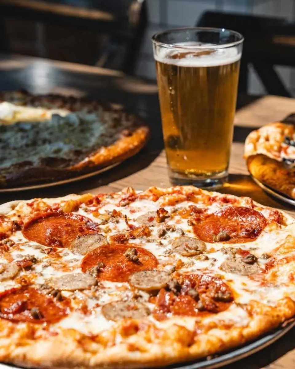 Pizza with beer at Goodfellas Pizzeria in Cincinnati