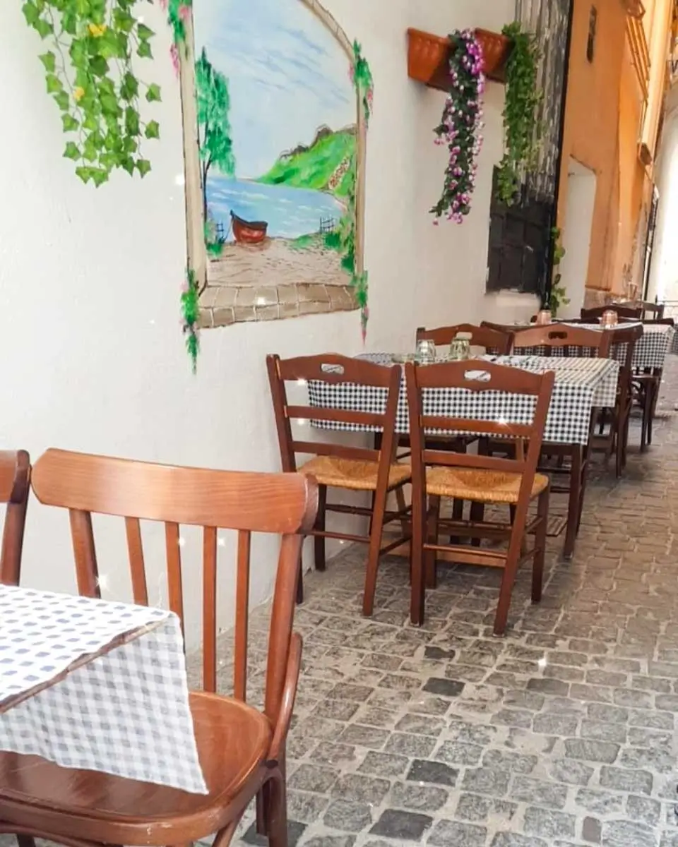 Seating area at Osteria dei Sapori in Salerno, Italy