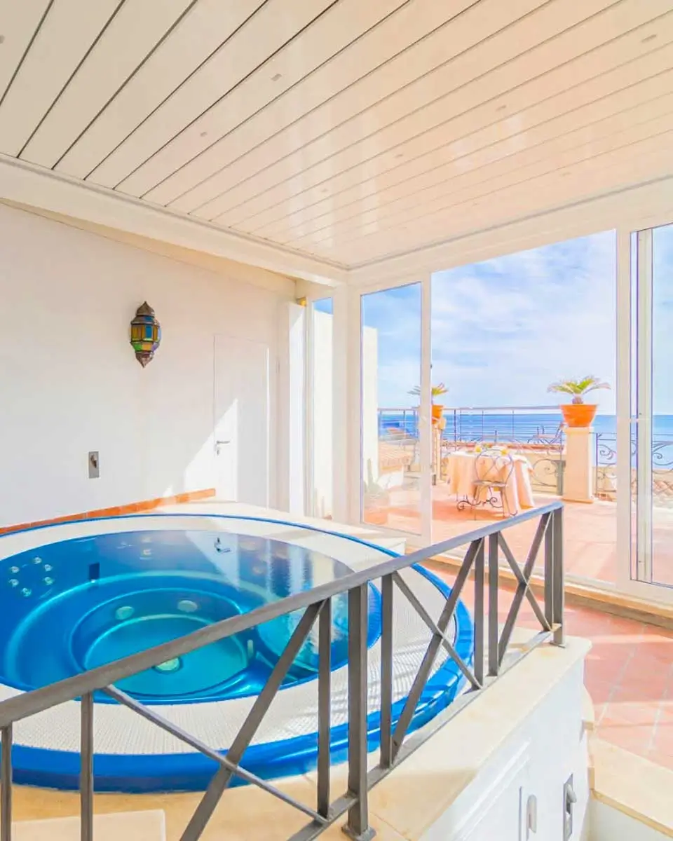 Whirlpool tub in a room at Algilà Ortigia Charme Hotel, Syracuse Italy