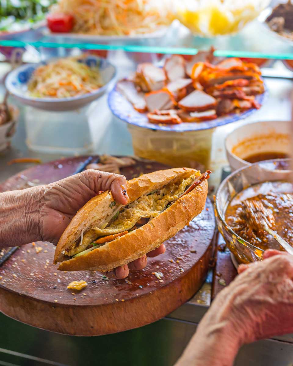 A-person-makes Bahn Mi in Phu Quoc, Vietnam