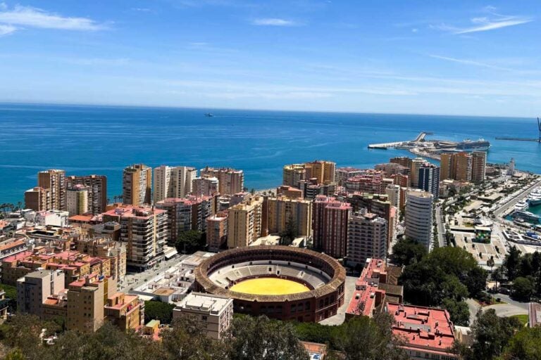 Aerial view of Malaga city with the bullring and ocean