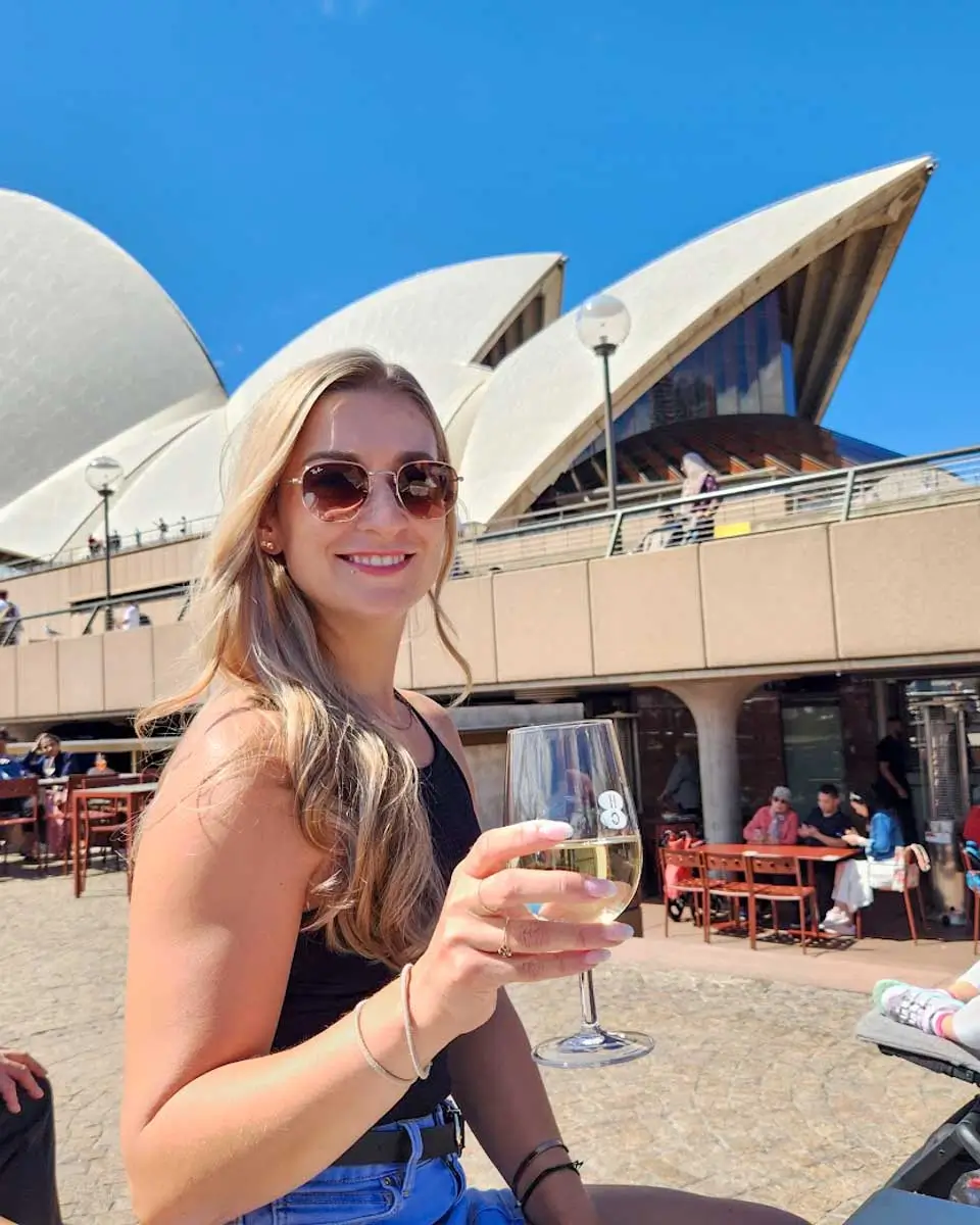 Bailey having a drink outside Sydney Opera House, Australia