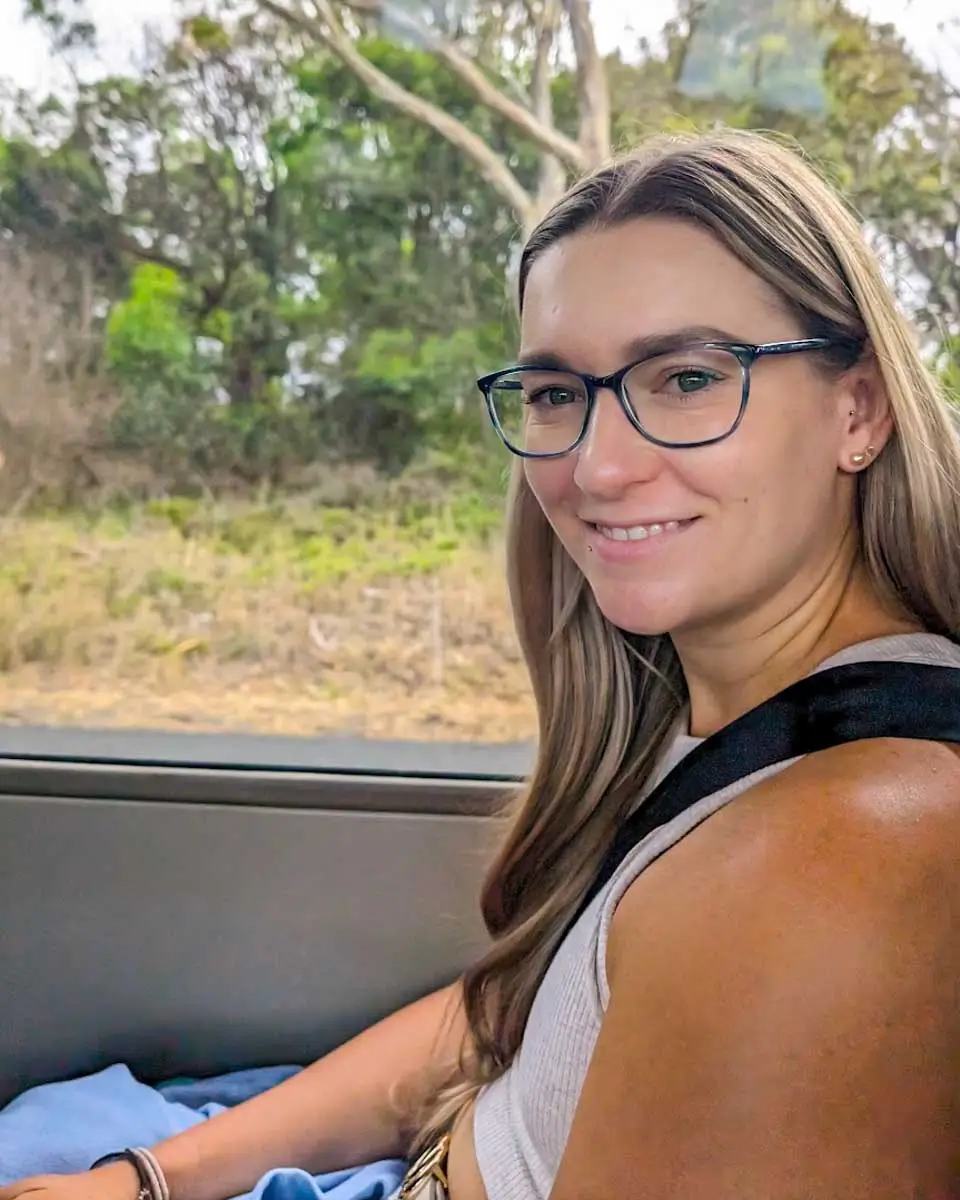 Bailey sitting in a 4wd coach to Fraser Island, Australia